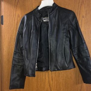 Women’s black “leather” coat.